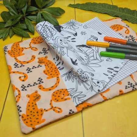 Première page de coloriage et page de pixel art du cahier de coloriage lavable guépards