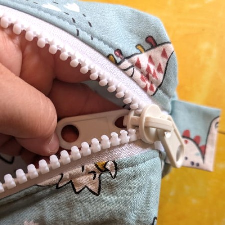 Fermeture éclair de la trousse à colorier dinosaures