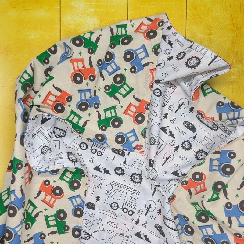 Tapis 4 en 1 tracteur déplié avec feutres posés dessus